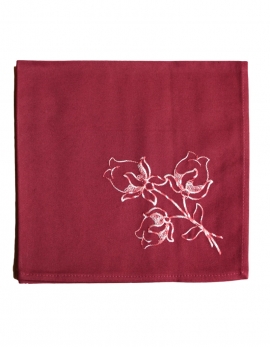 Napkin in pure cotton, burgundy raspberry colour, embroidered with lotus flowers, made in France