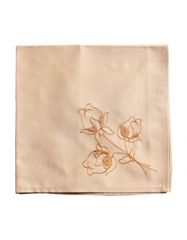 Embroidered napkin with orange thread on a light percale beige, made in France